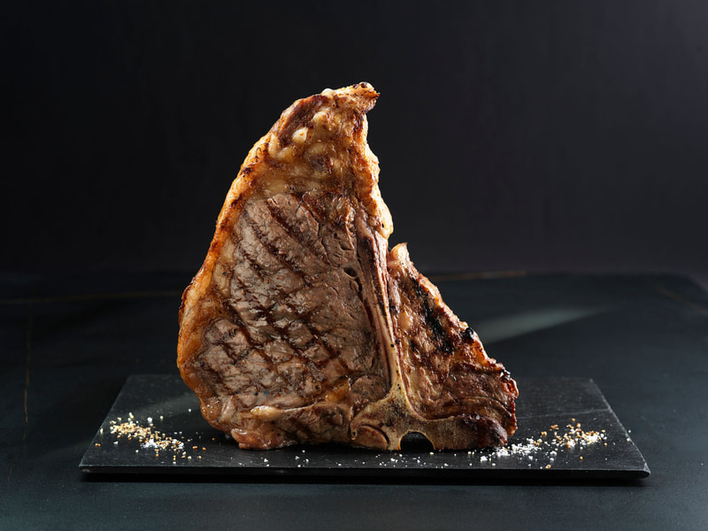 a flame grilled T-bone steak 